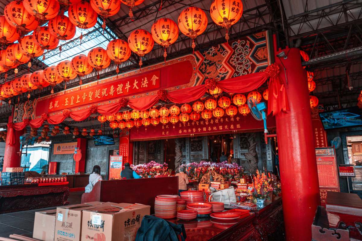 taiwan red and white cardboard boxes on brown wooden table wide angle
