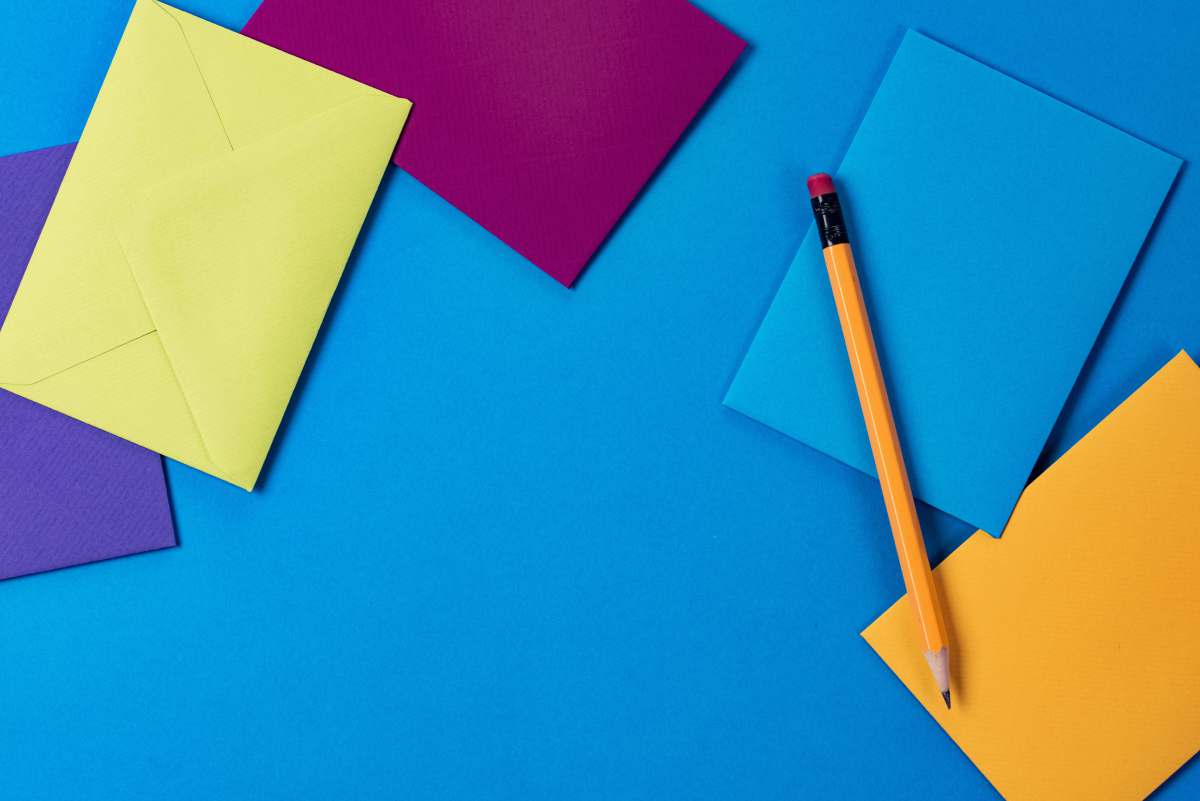 color assorted-color paper and brown wooden pencil blue