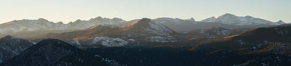 scenery brown and black mountains under blue sky during daytime panoramic