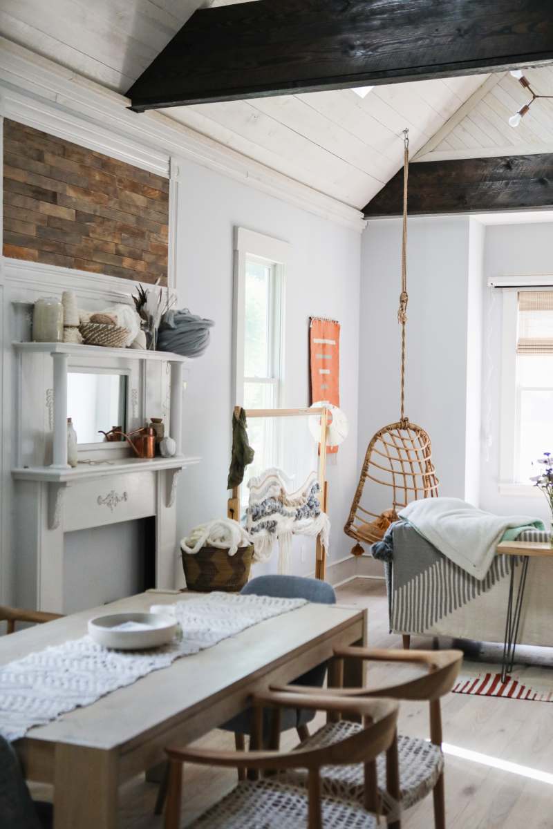 interior white wooden table near white wooden framed glass window grey