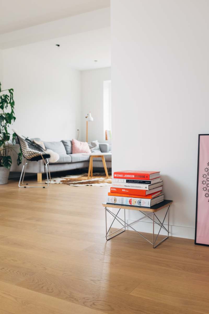 interior books on brown wooden stool interior design
