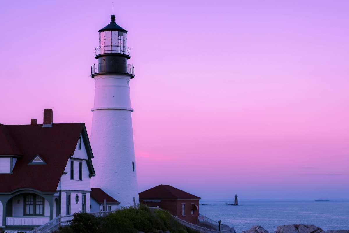 lighthouse in distant white lighthouse cape elizabeth