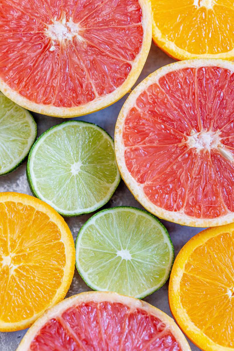 orange sliced orange and green citrus fruits grapefruit