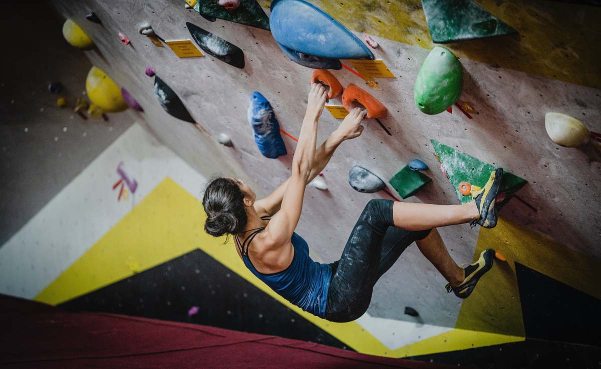 istanbul woman rock climbing inside building rock climbing