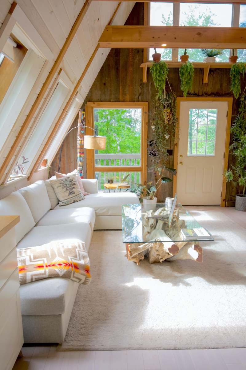 stowe white couch beside green potted plant vermont