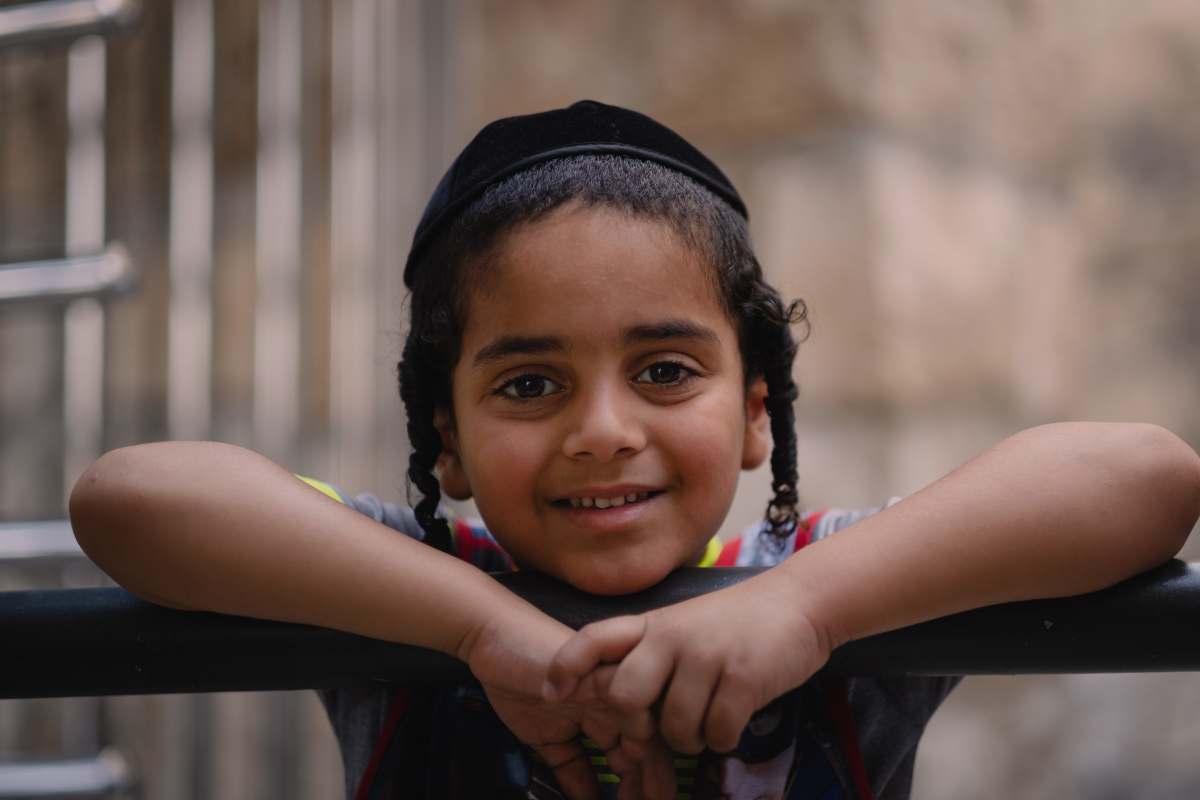 jerusalem girl in black knit cap smiling israeli jews