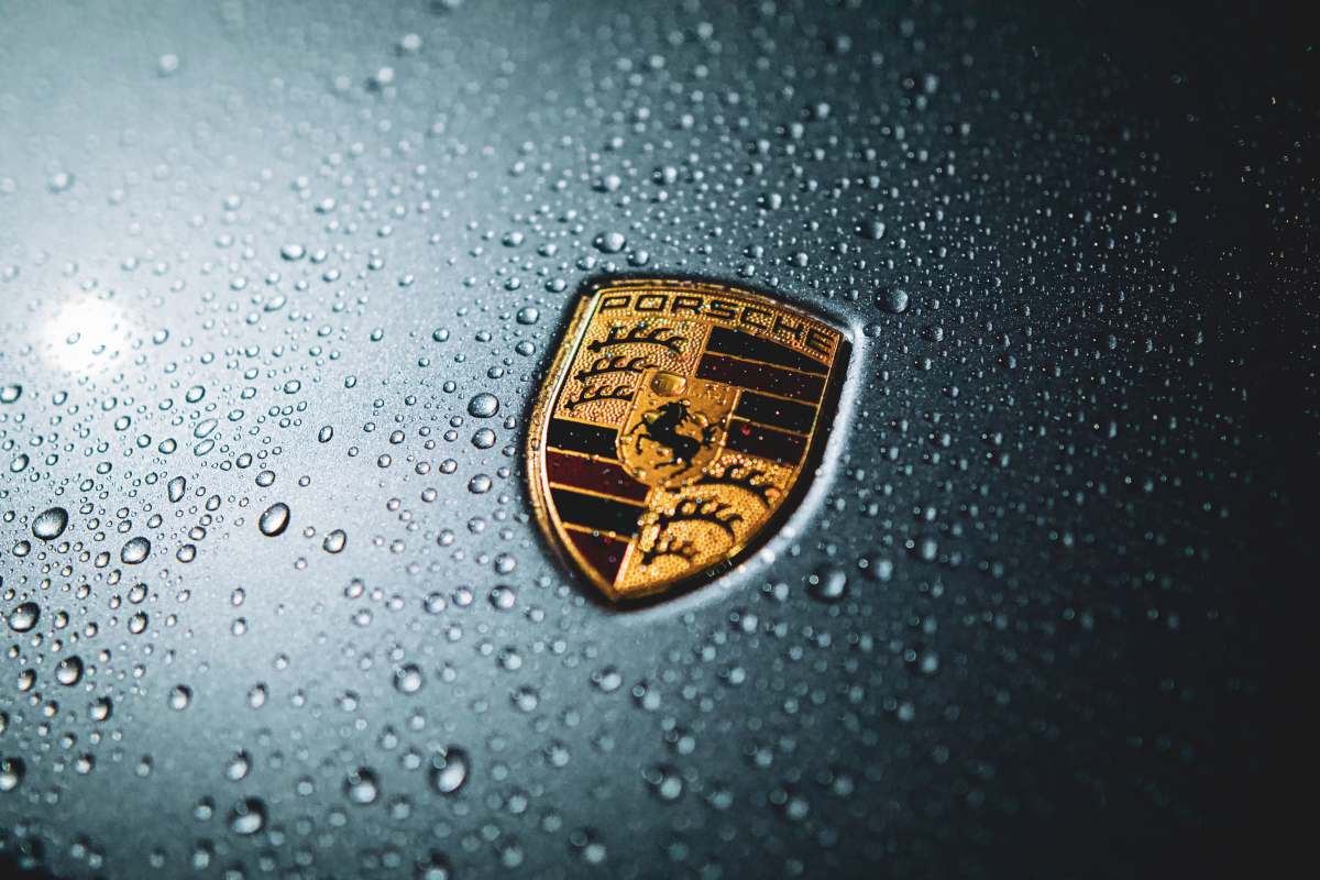 stuttgart gold and black emblem on gray surface logo