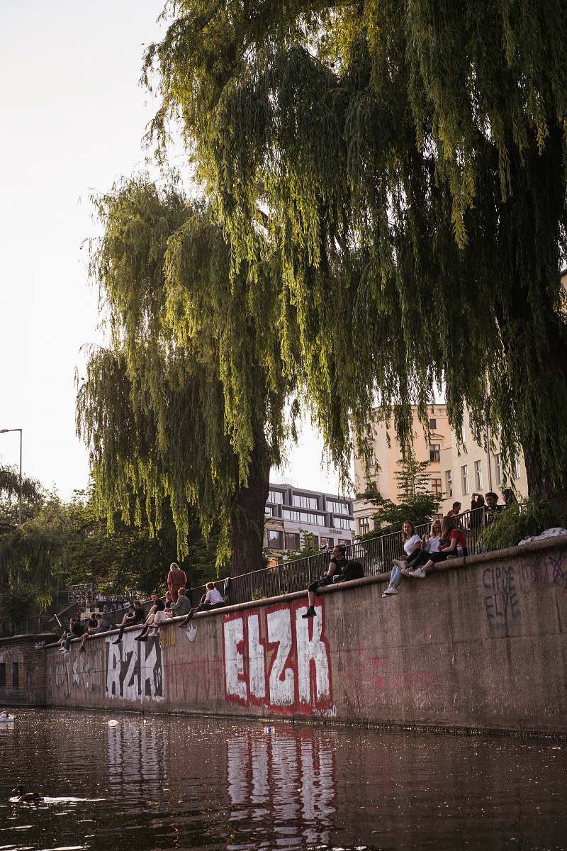 berlin green trees beside concrete wall landwehrkanal