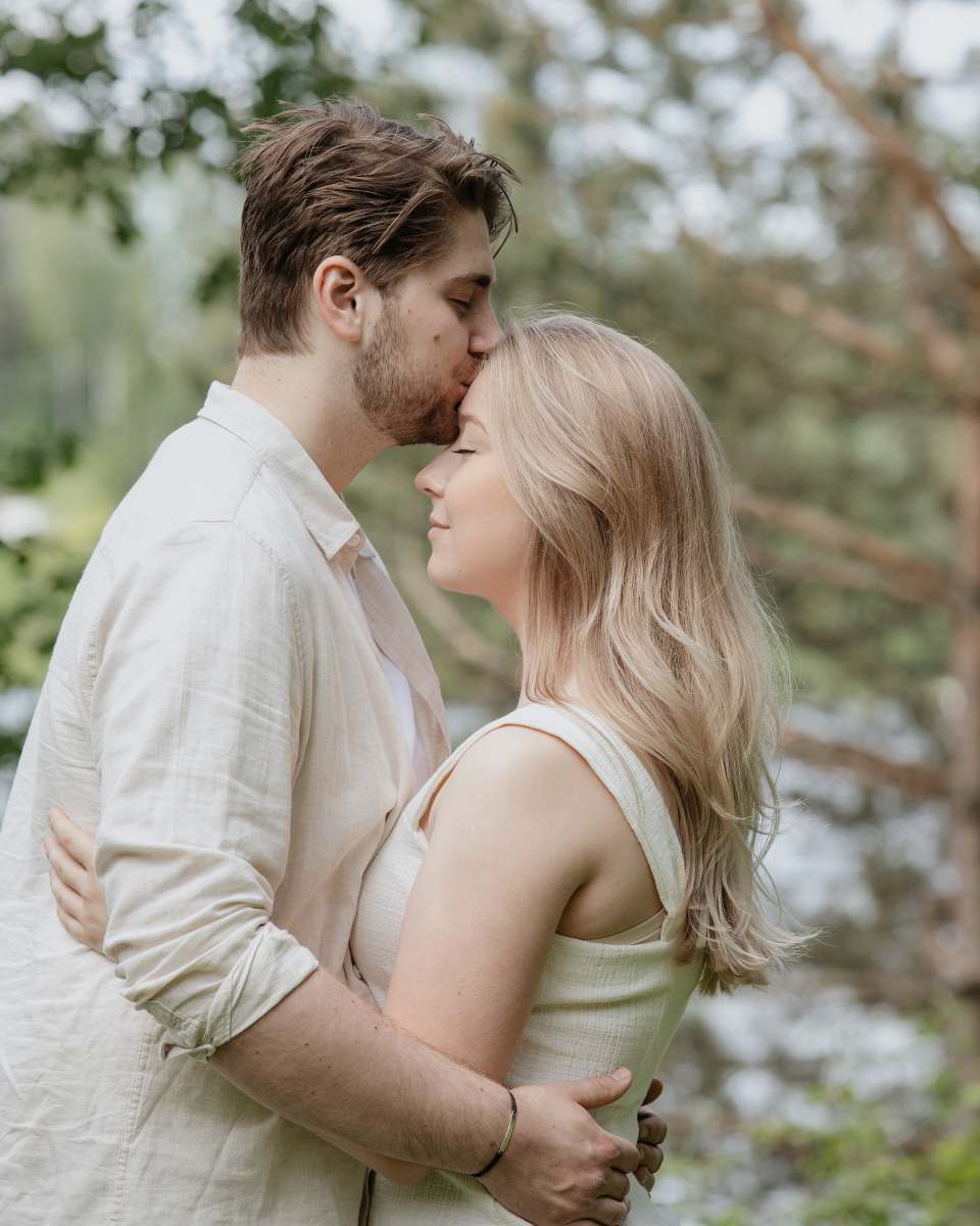couple man and woman kissing during daytime love
