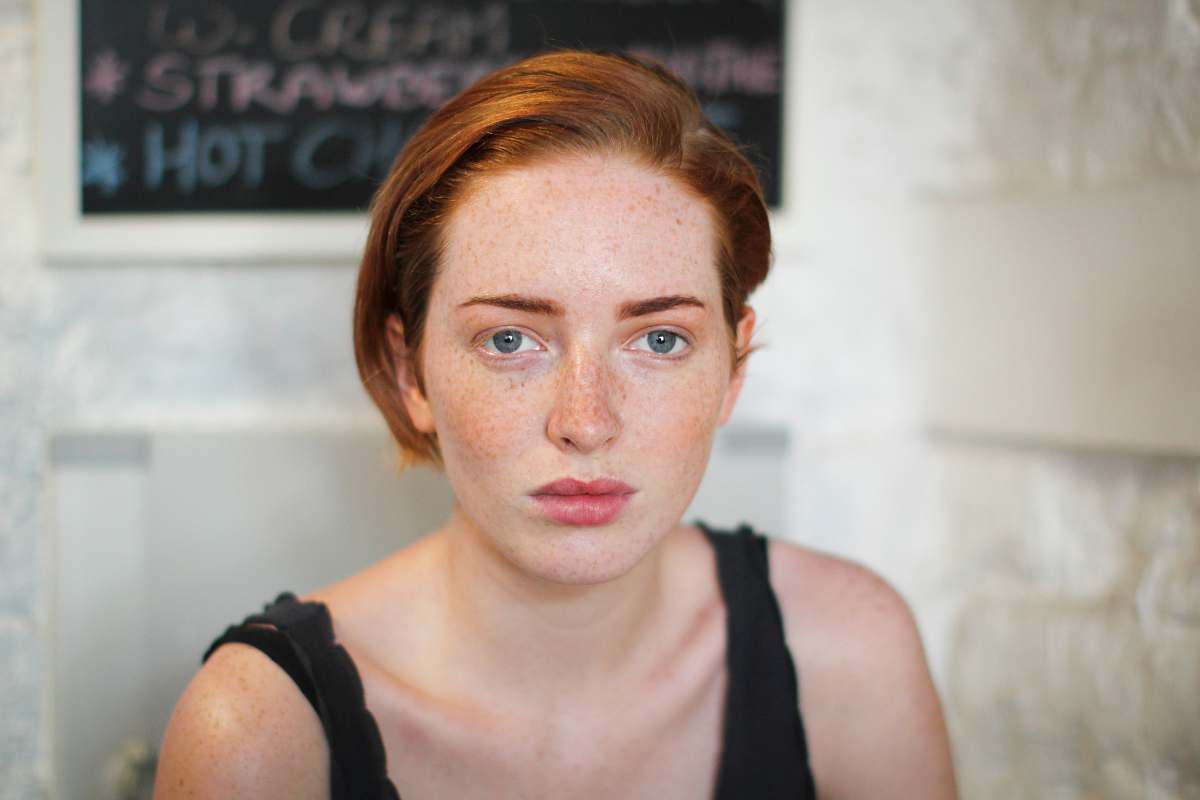 person woman wearing black tank top human