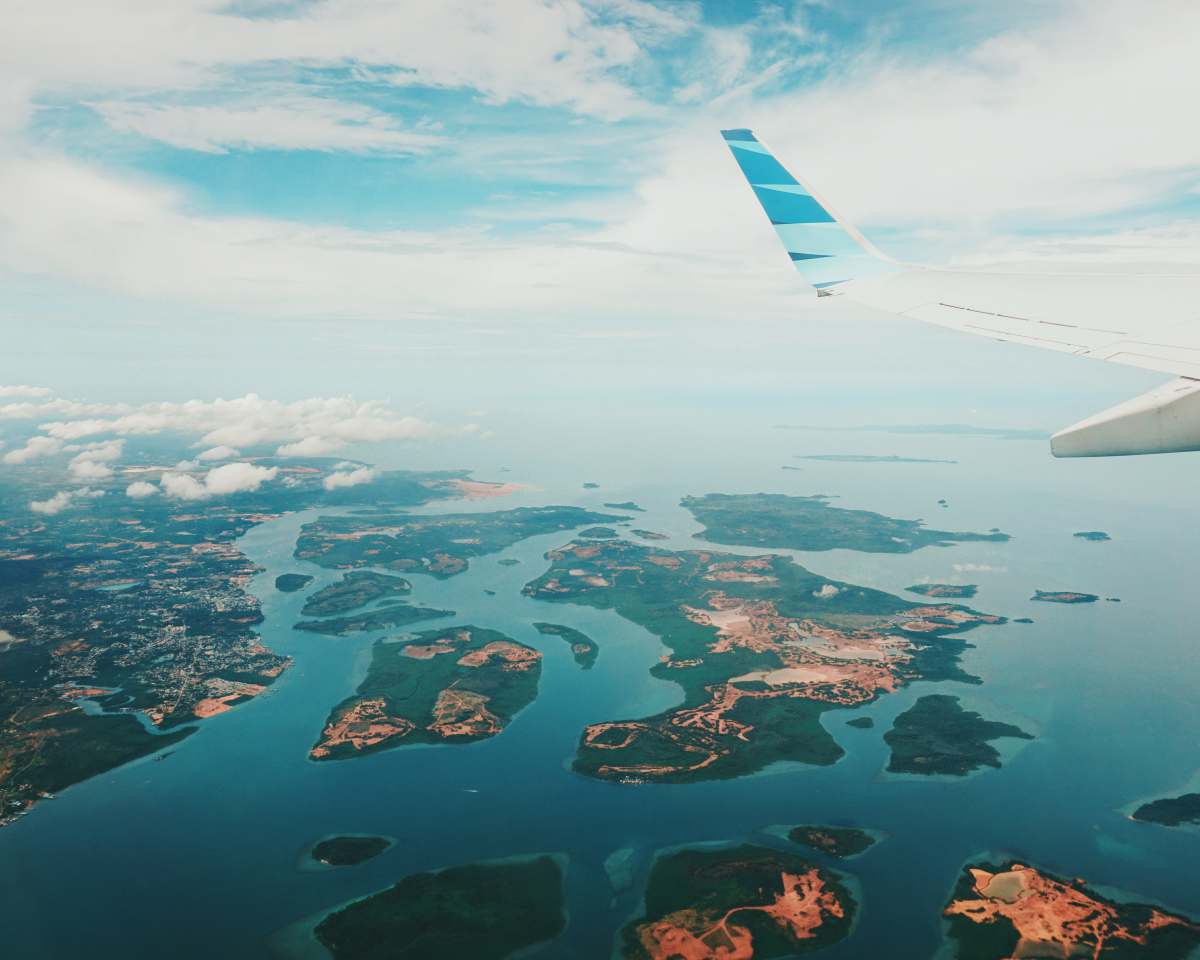 ocean aerial photography of islands from airplane tanjung pinang city