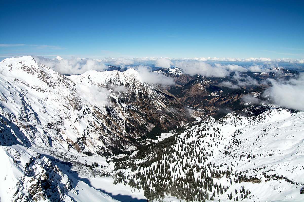 snow aerial photo of mountains covered with snow under cloudy sky alps