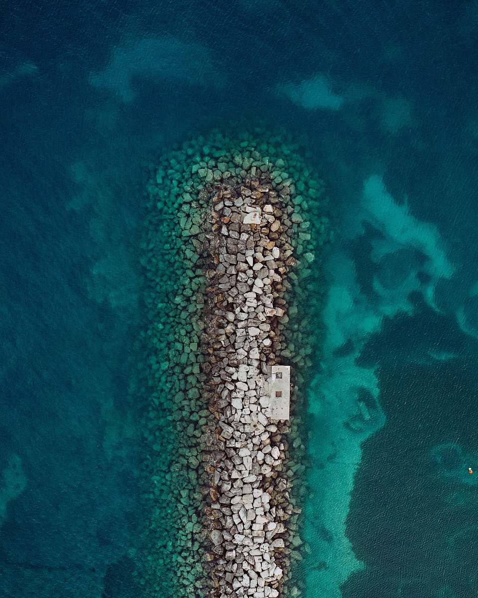 nature aerial photo of islet outdoors