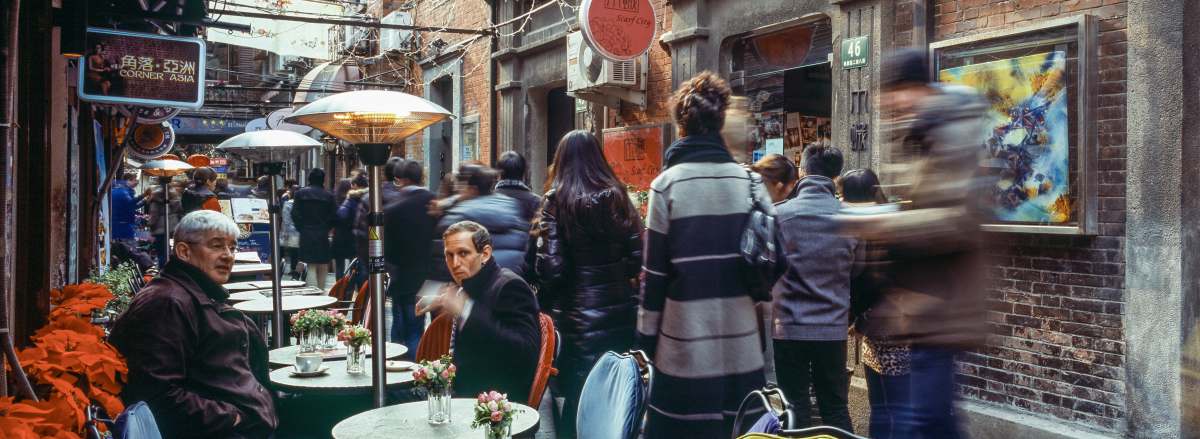 cafe group of people outside store restaurant