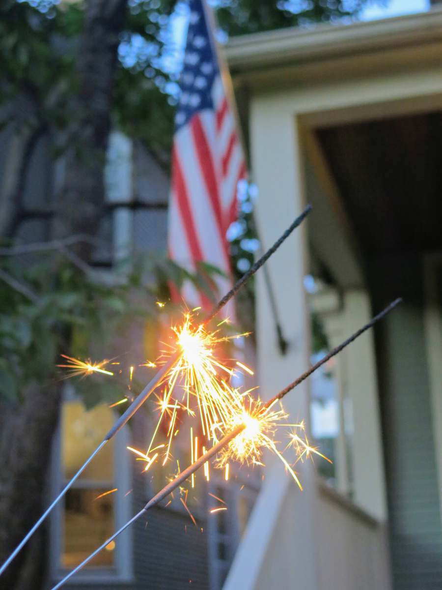  yellow and red fireworks on tree 