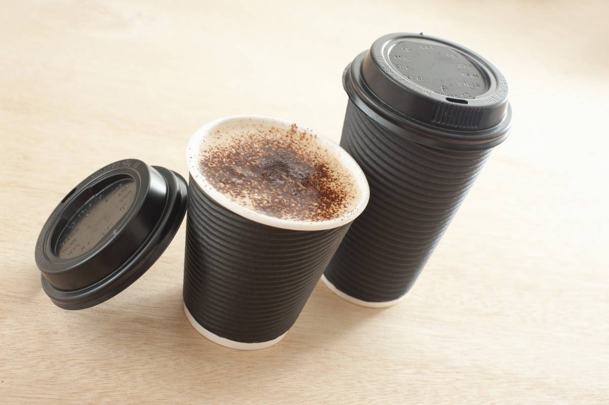 Two takeaway coffees - Free Stock Image