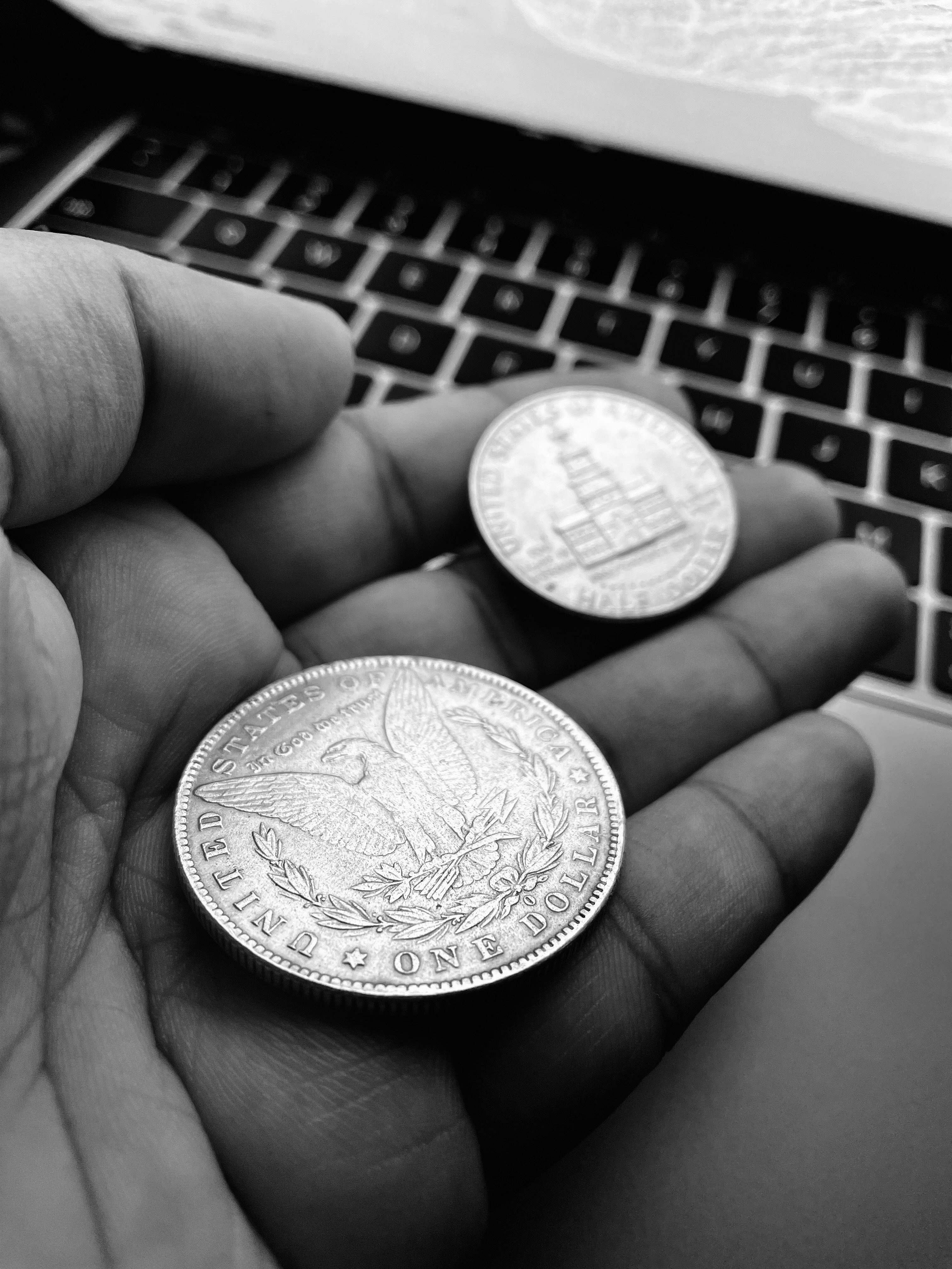Electronics Person Holding Silver Round Coin Hardware Image Free Photo