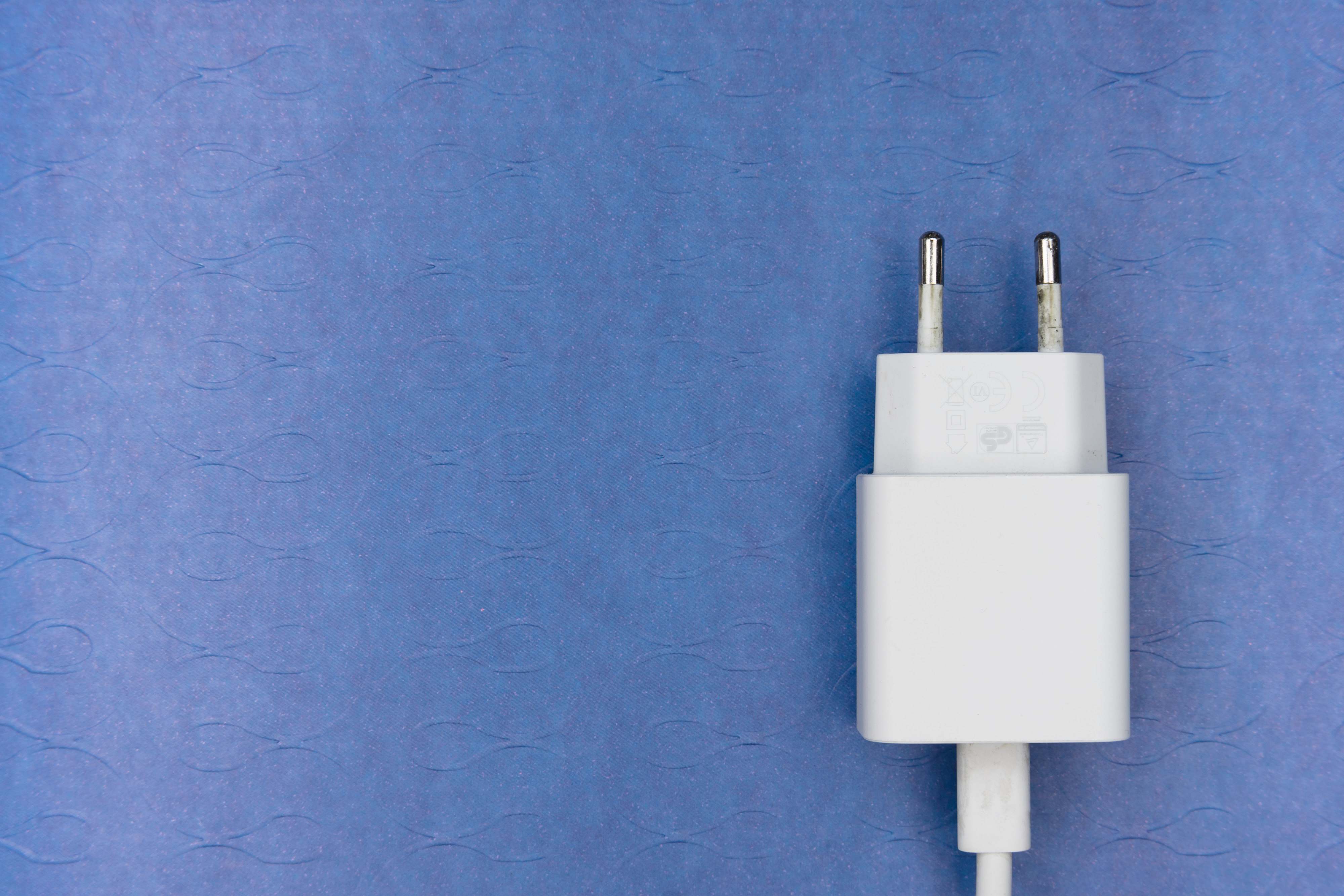 Adapter White Adapter On Purple Textile Plug Image Free Photo