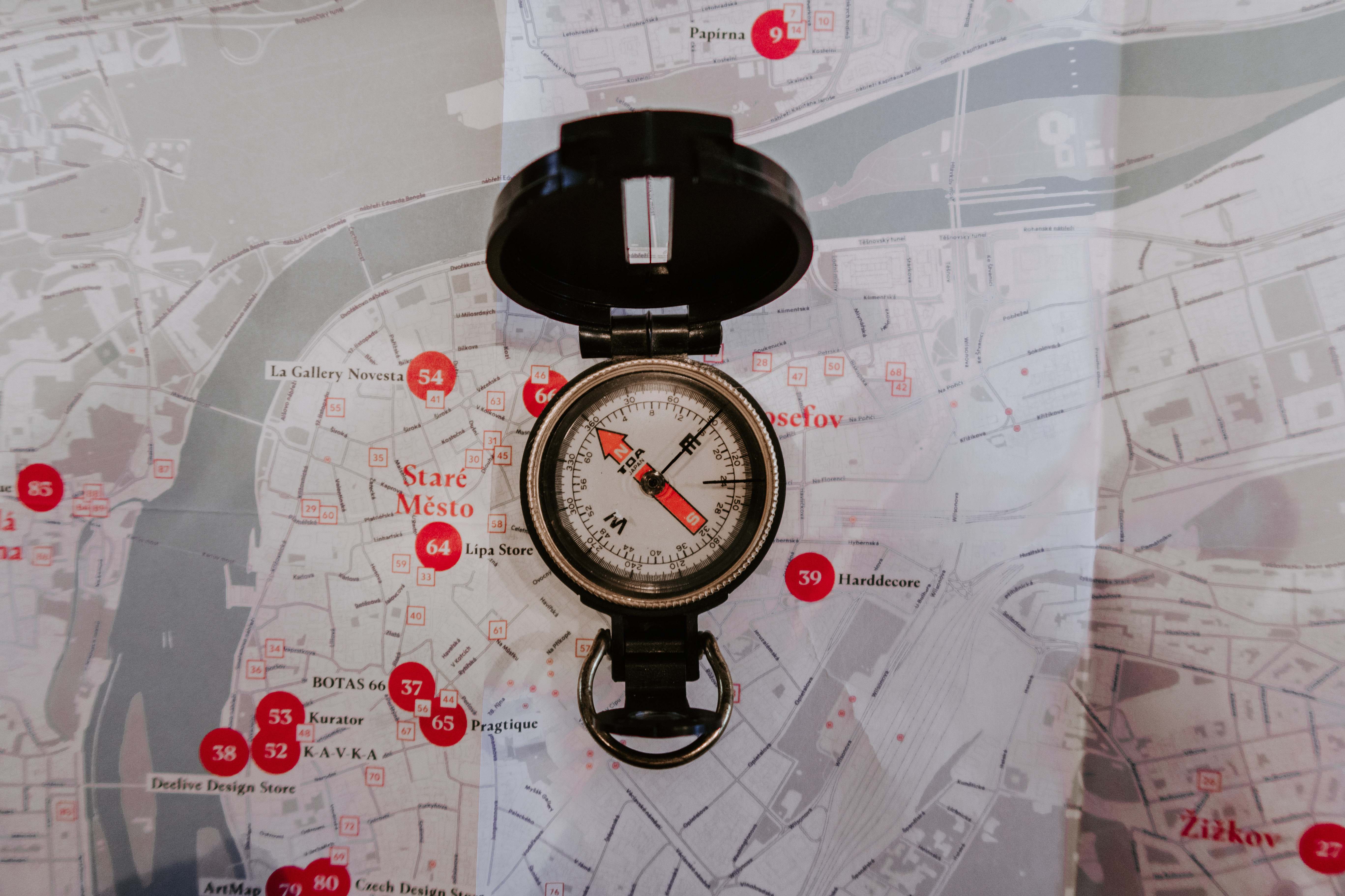 Direction Round Black Metal Compass On Map Wanderlust Image Free Photo