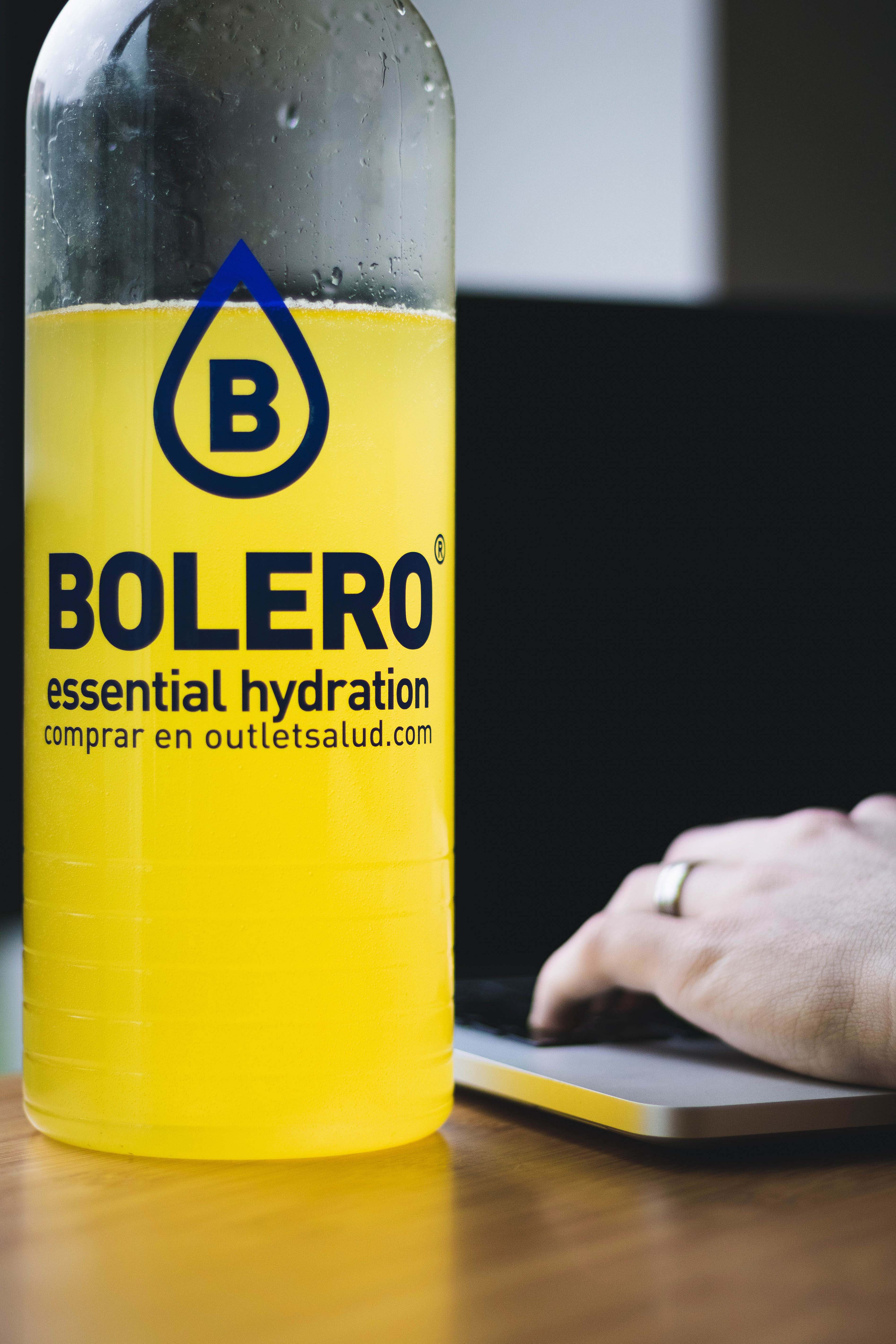 Yellow And Black Labeled Bottle Image Free Photo