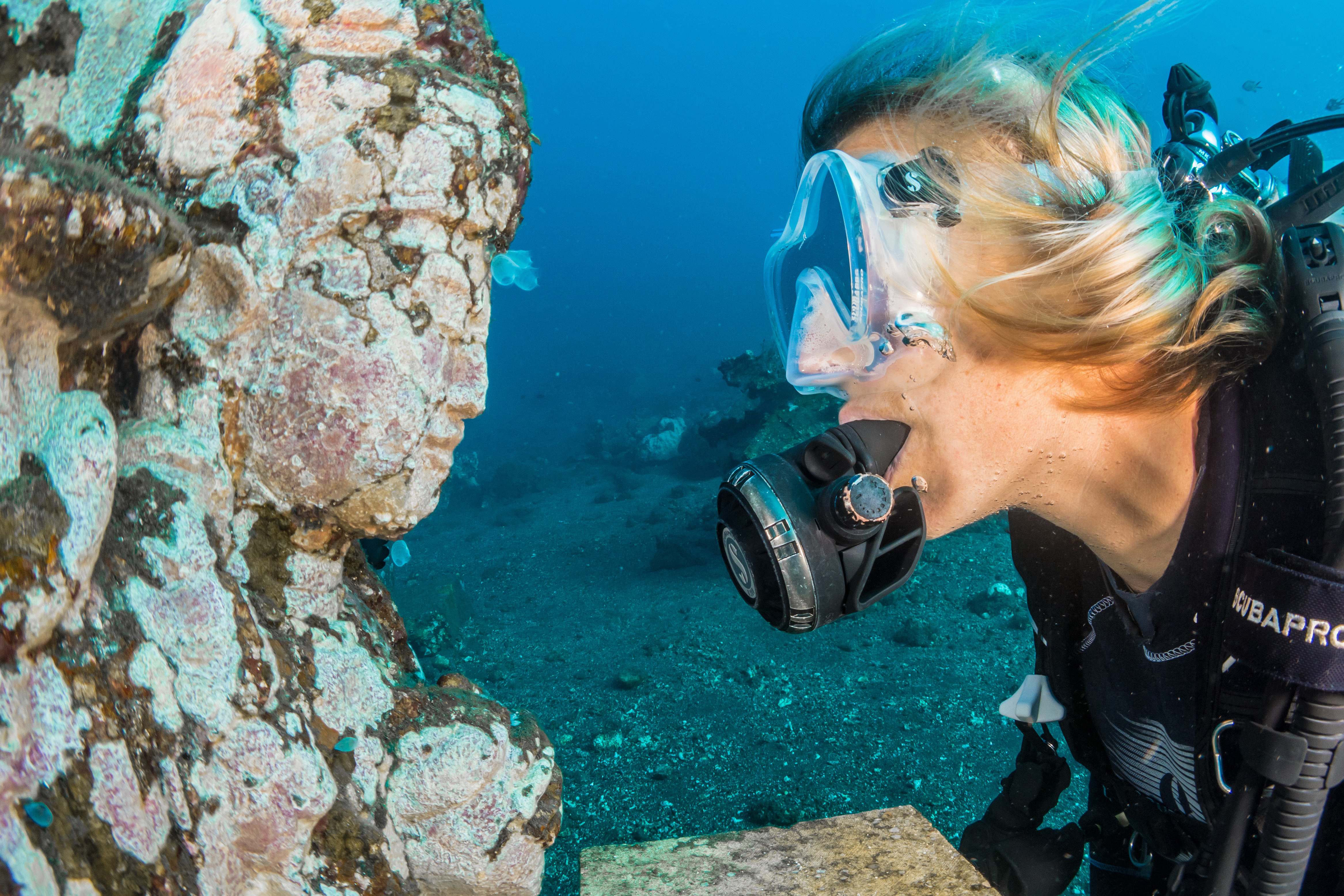 Indonesia Man Underwater Looking At Religious Statue Sea Image Free Photo