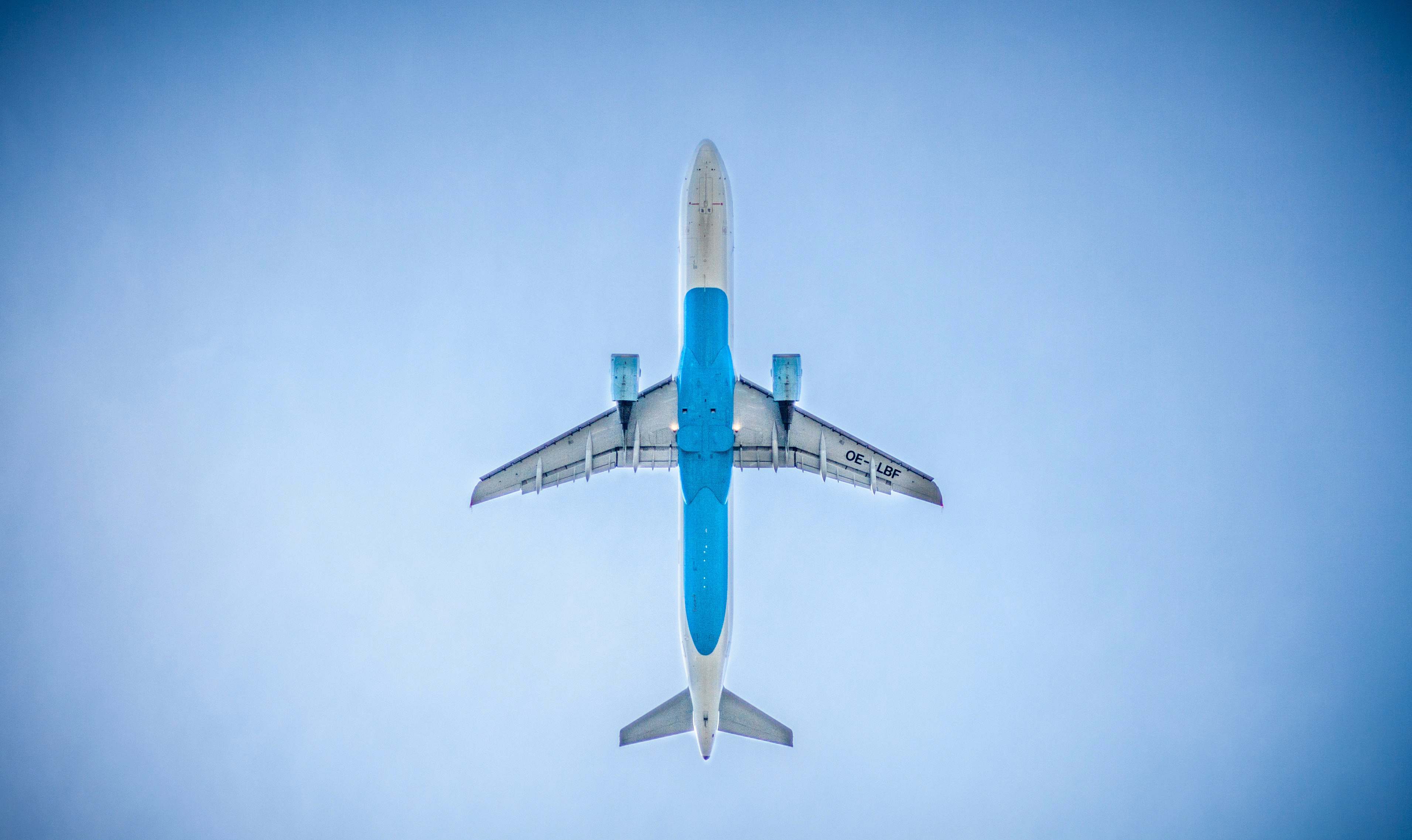 Low Angle Photography Of Blue Commercial Airplane Image Free Photo