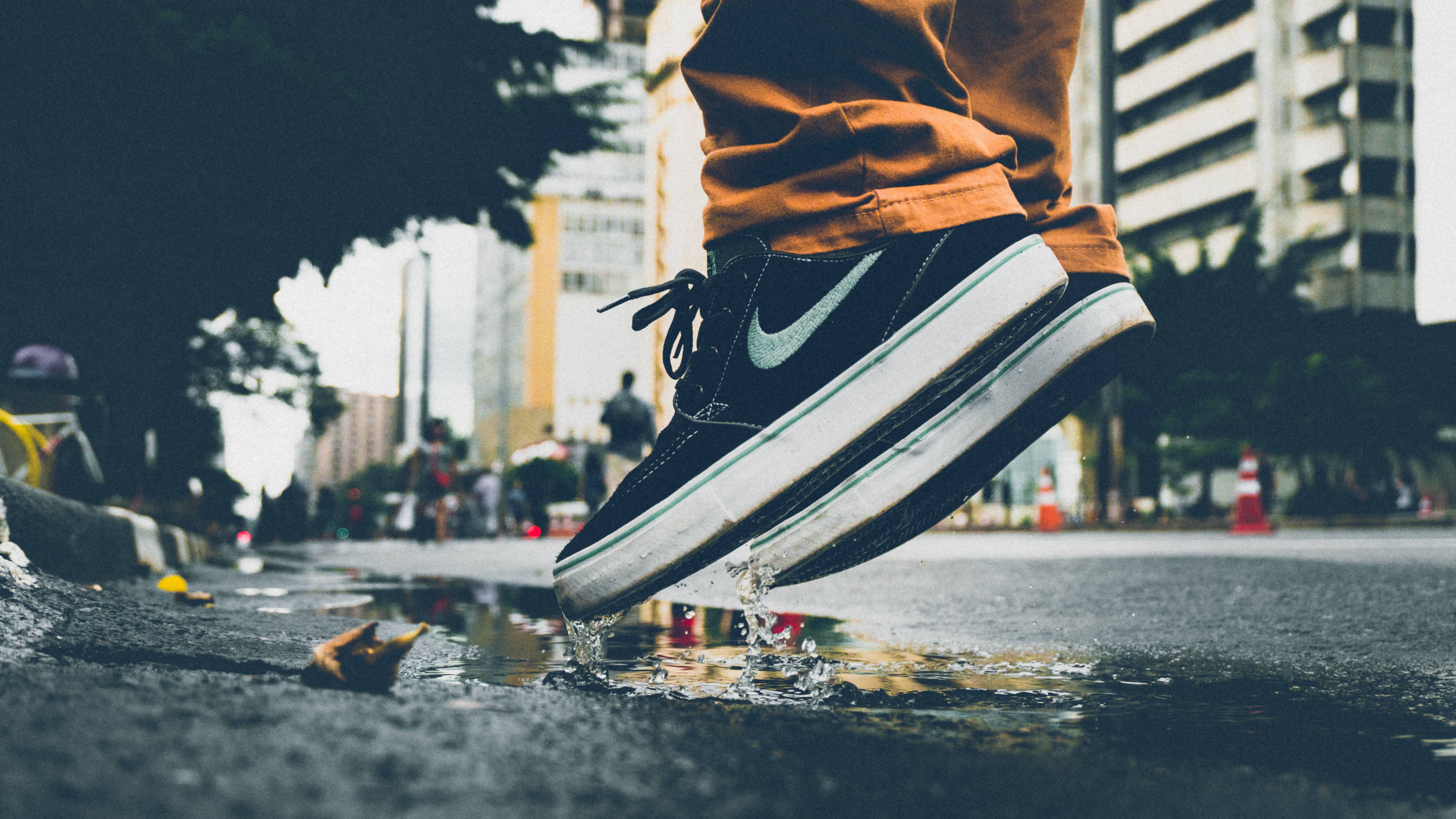 Man Jumping Puddle Nike - NegativeSpace Image Free Photo