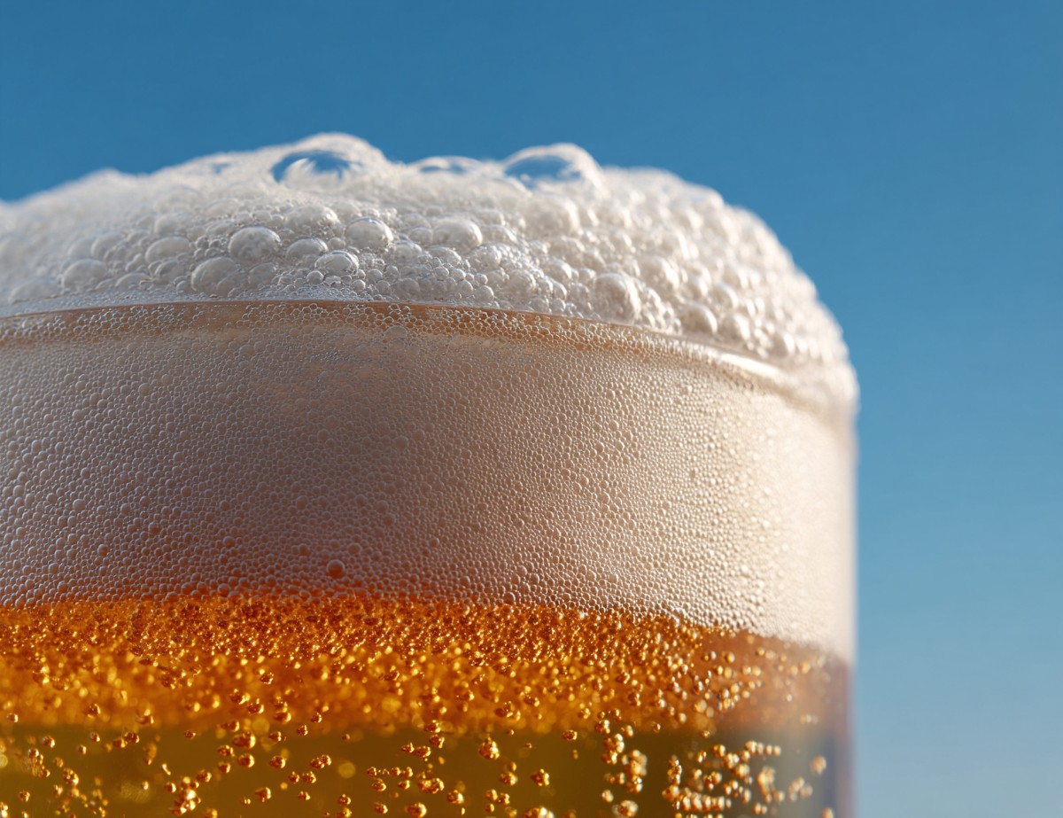 close beer foam top glass with blu 434e5980 836c 452e