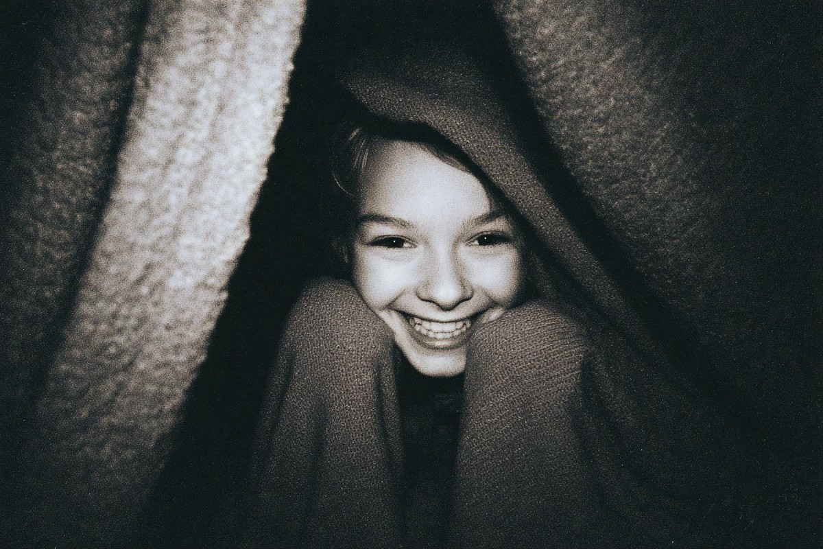fingers poking out blanket fort entrance laught 9d141af9 3bda 40c5