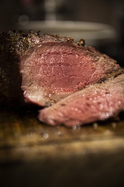 Sliced Argentine Beef Loin on Rustic Cutting Board