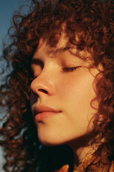 self acceptance profile shot person with curl ccc58be5 9394 44b4