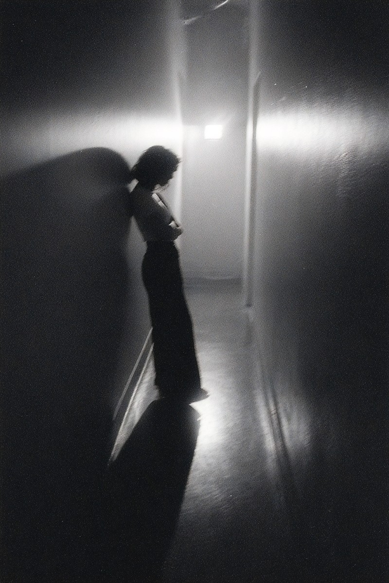 self sabotage person standing alone hallway wit dfab2ee9 d70d 43e5