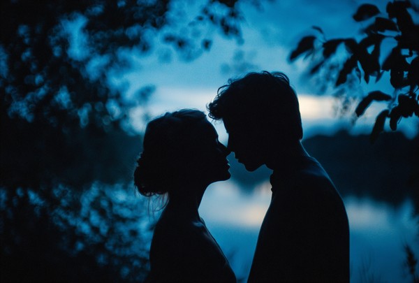 silhouette couple facing each other almost 64824b0a 56a3 49b6 9b6d