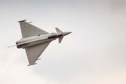 aircraft white fighting jet flying in mid-air airplane