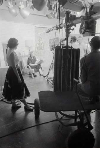 male grayscale photography of people inside studio teenager