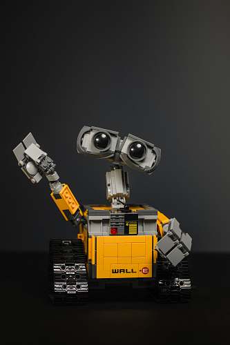robot yellow and gray robot toy 