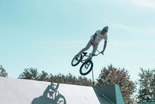 bicycle man riding BMX bicycle wheel