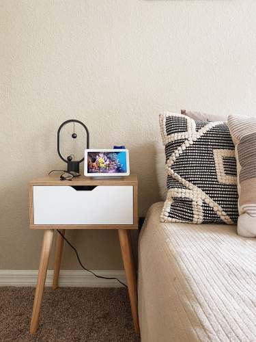 pillow black ipad on brown wooden table cushion