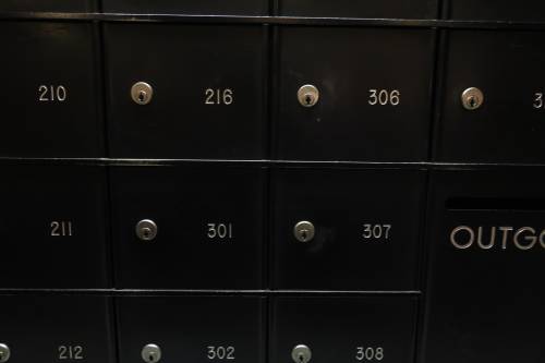 Mailbox numbers in apartment building image - Free