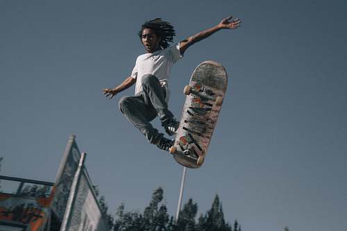 toowoomba man wearing white T-shirt using skateboard australia