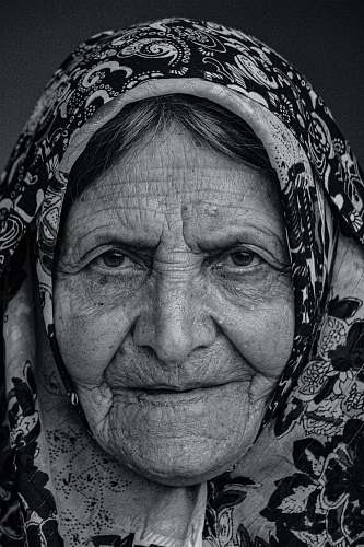  woman in black and white floral hijab 