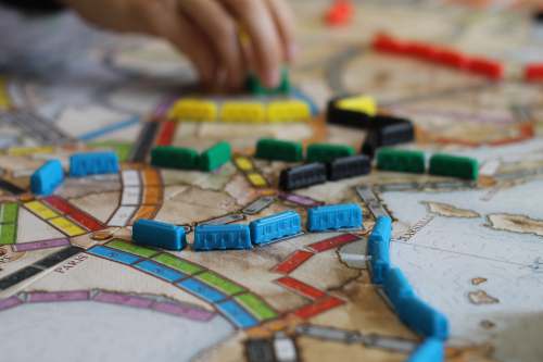 games. blue yellow and green plastic blocks ticket to ride