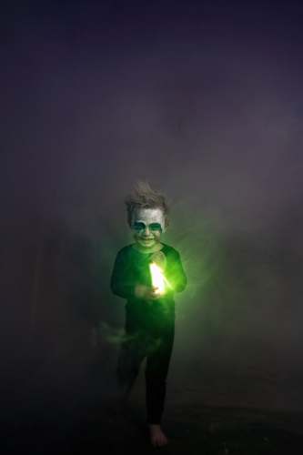 joker man in green shirt singing hero
