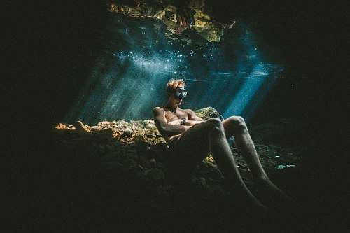 people man relaxing under water diver
