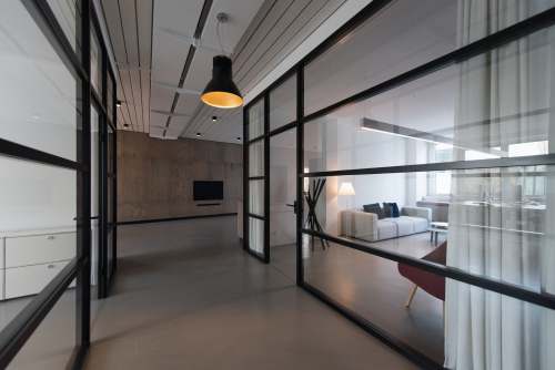 interior room with glass divider and white curtain sunday digital