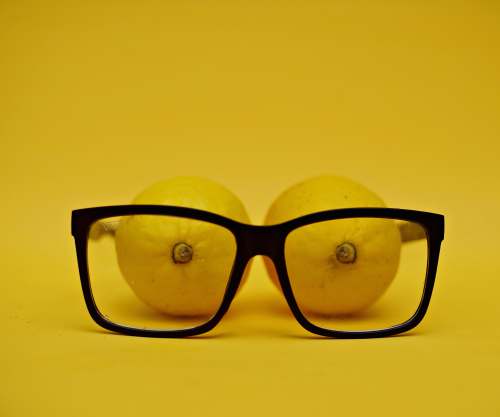 unporn black framed eyeglasses on yellow surface sex education