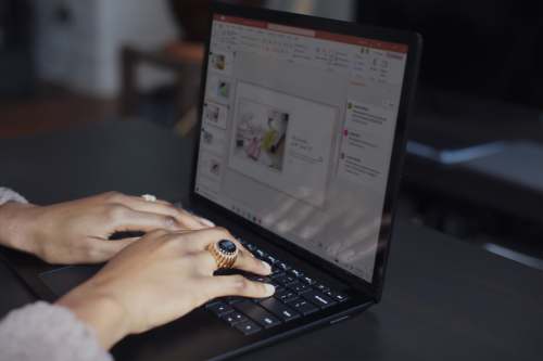 pc person using black Surface device electronics