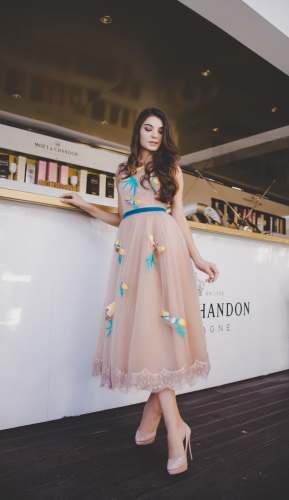 dress woman wearing peach-colored maxi dress woman