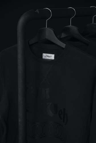 fashion black crew-neck t-shirt on clothes hanger clothes