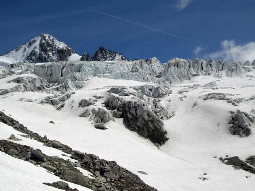  snow covered mountain under blue sky during daytime 